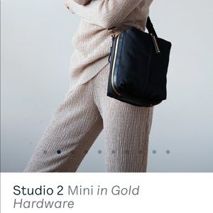 Caraa mini cross body bag in black